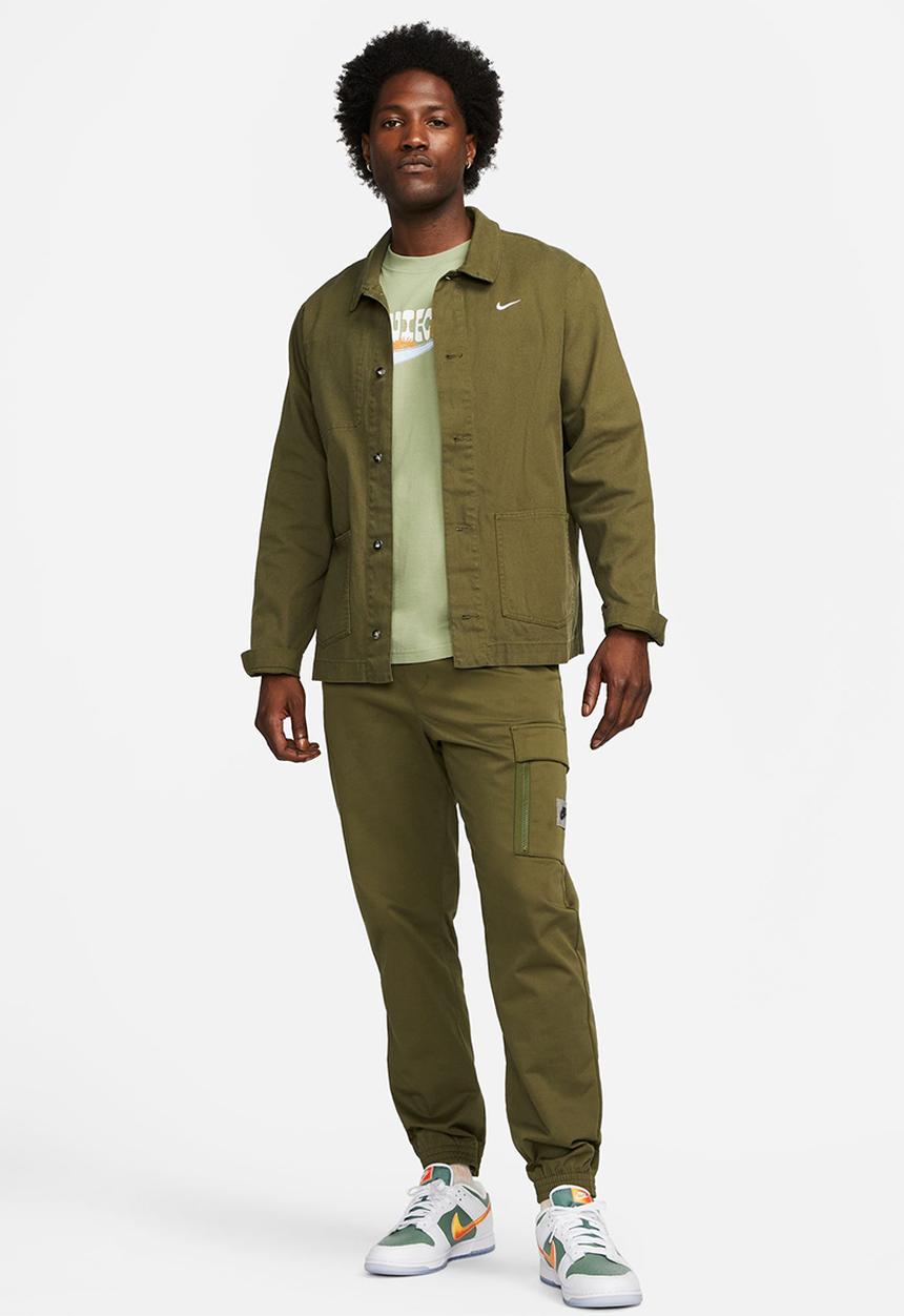 Nike - NSW Woven Trousers.- rough green & safety orange