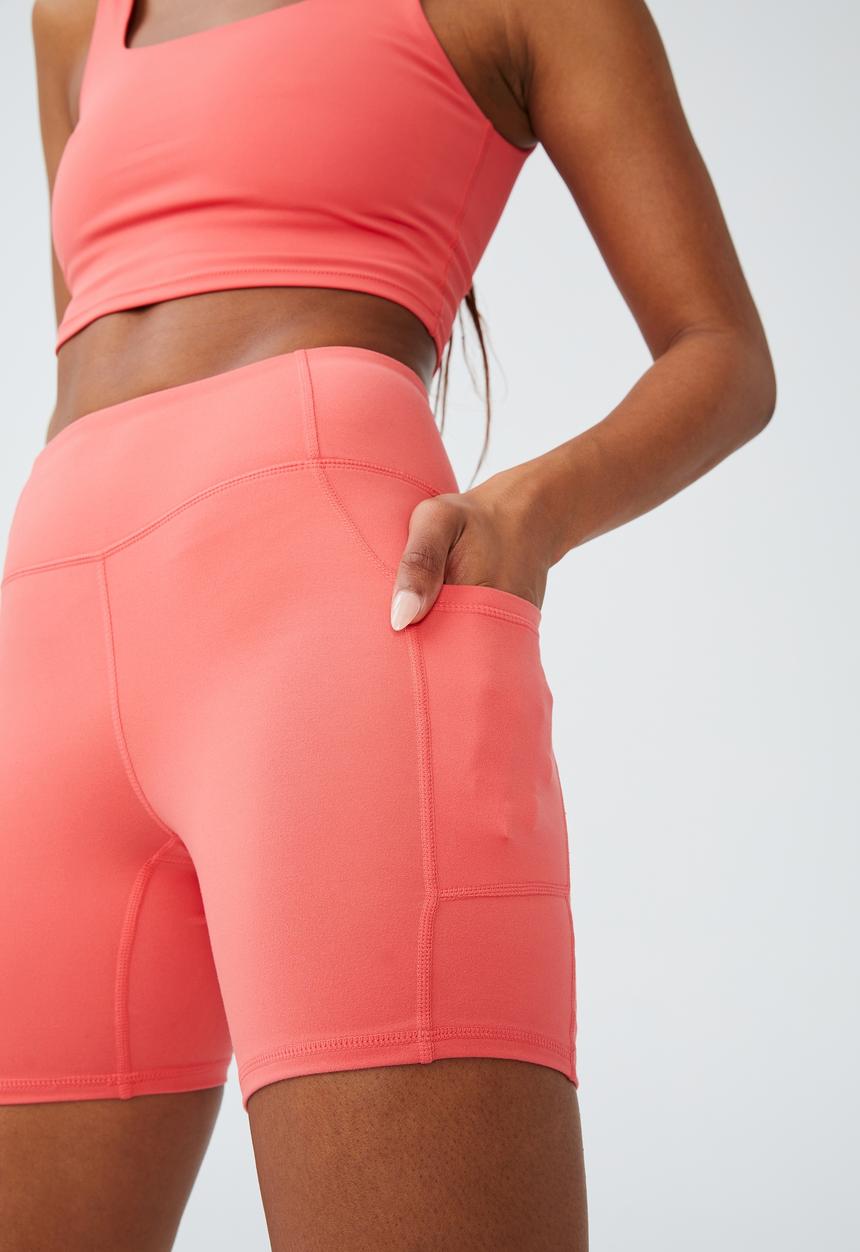 Cotton On - Ultra soft booty lift pocket bike short - coral burst