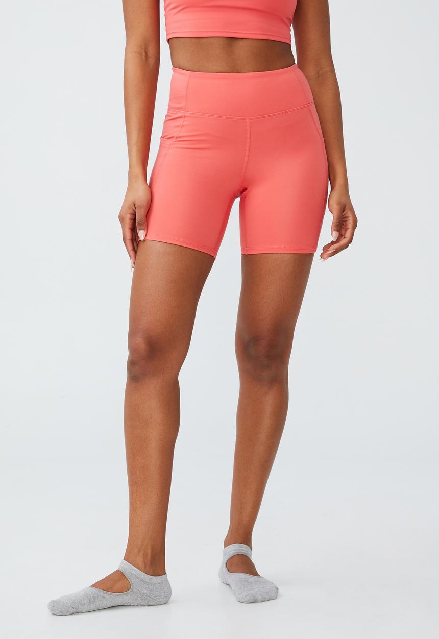 Cotton On - Ultra soft booty lift pocket bike short - coral burst
