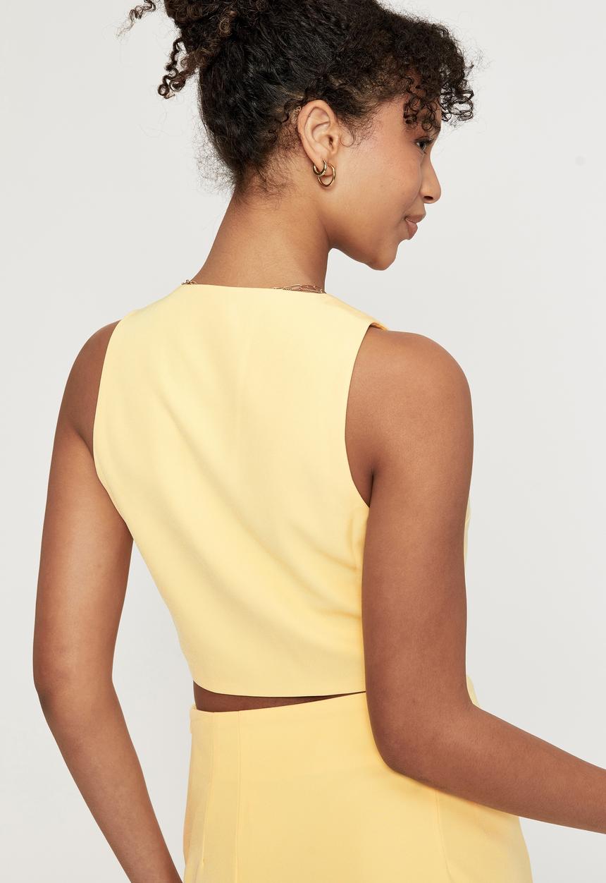 Supré  - Indigo sleeveless waistcoat - banana