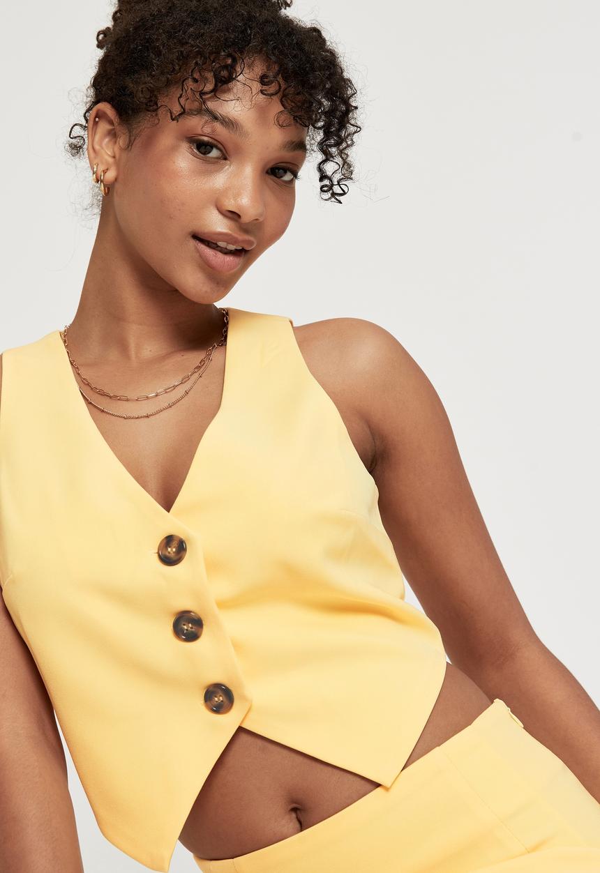 Supré  - Indigo sleeveless waistcoat - banana