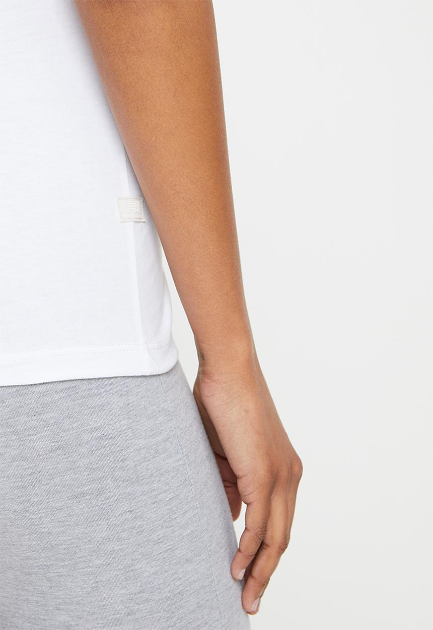 New Balance  - Nb essentials magnify tee - white