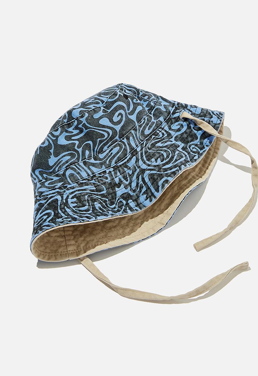 Cotton On - Reversible bucket hat - wonky whip/rainy day
