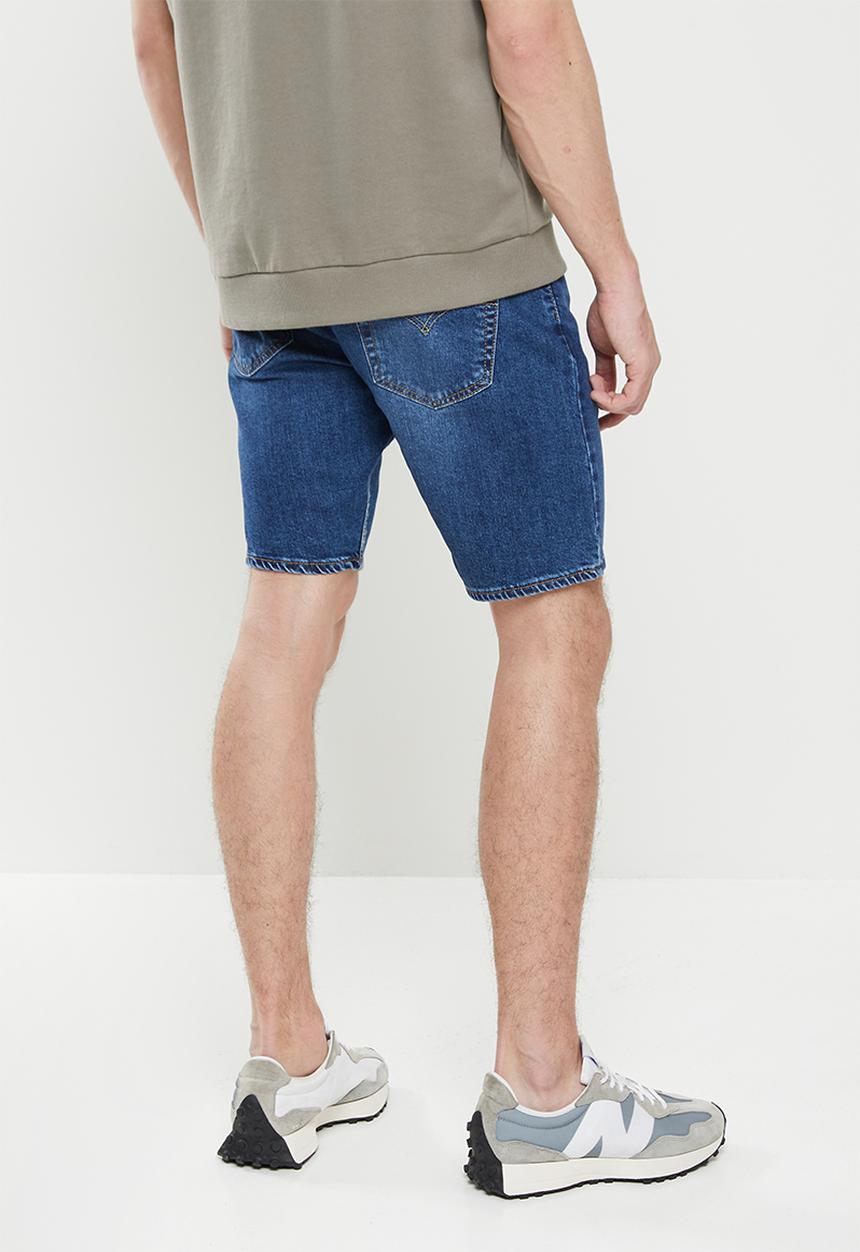 Levi’s® - 412 slim short - mid-blue