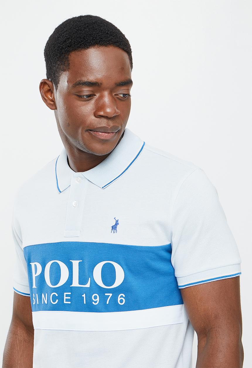 POLO - Men colour blocked logo golfer - blue