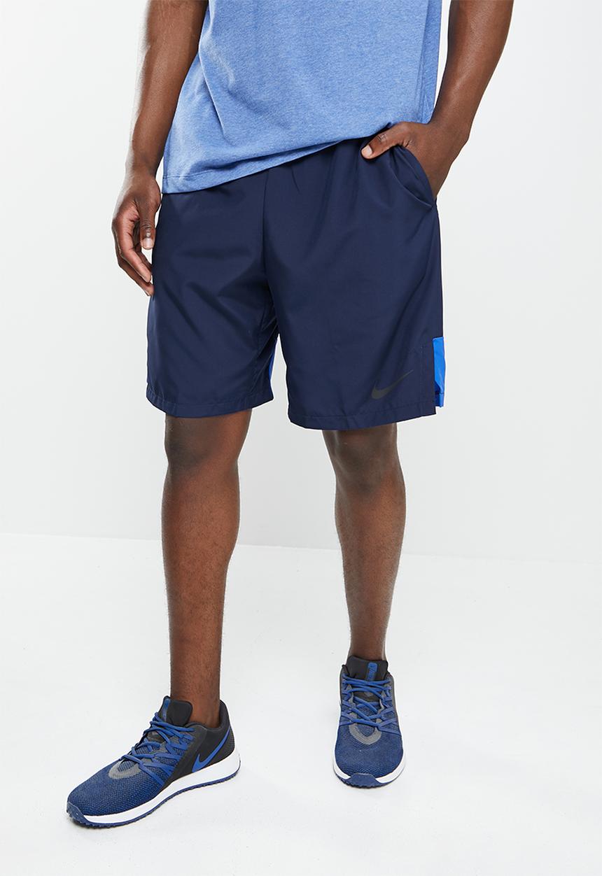 Nike - Woven training shorts - obsidian/game royal/black