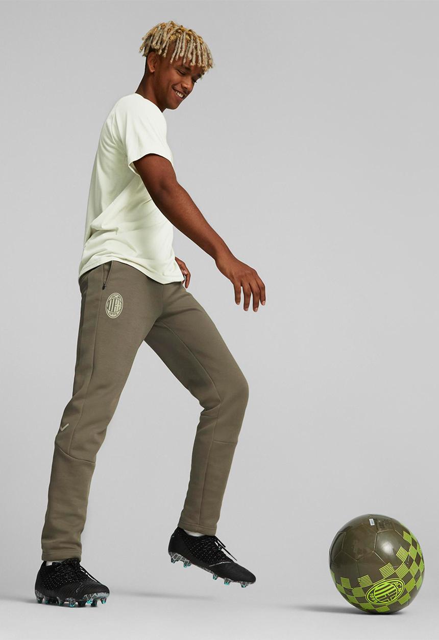 PUMA - Acm casuals pants - dark green moss-spring moss