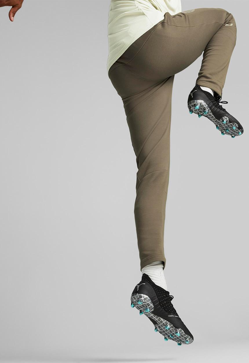 PUMA - Acm casuals pants - dark green moss-spring moss