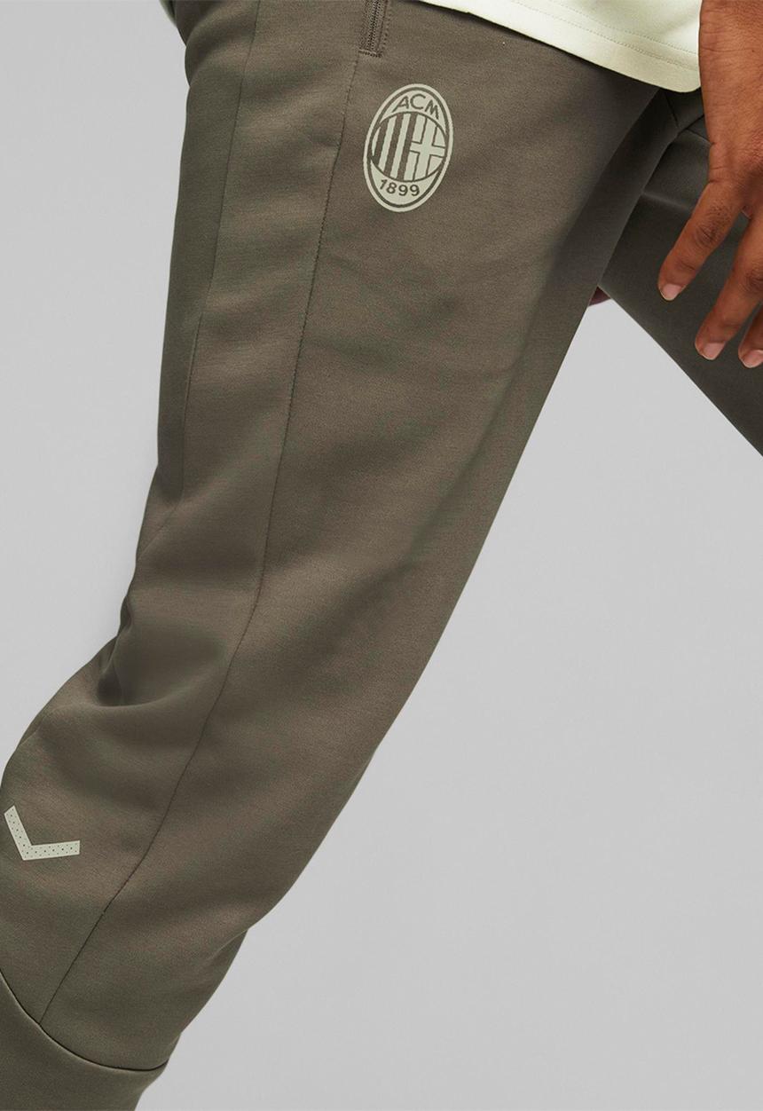 PUMA - Acm casuals pants - dark green moss-spring moss