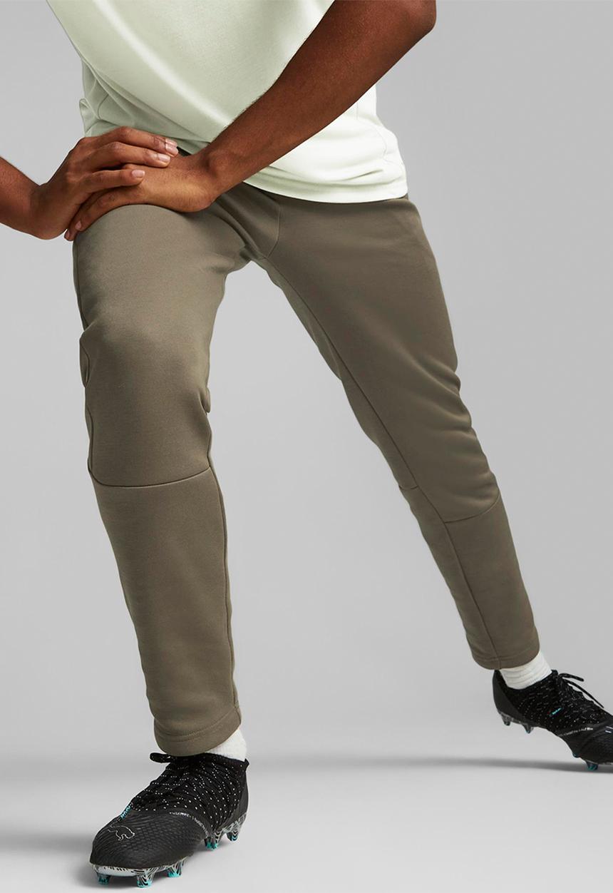 PUMA - Acm casuals pants - dark green moss-spring moss