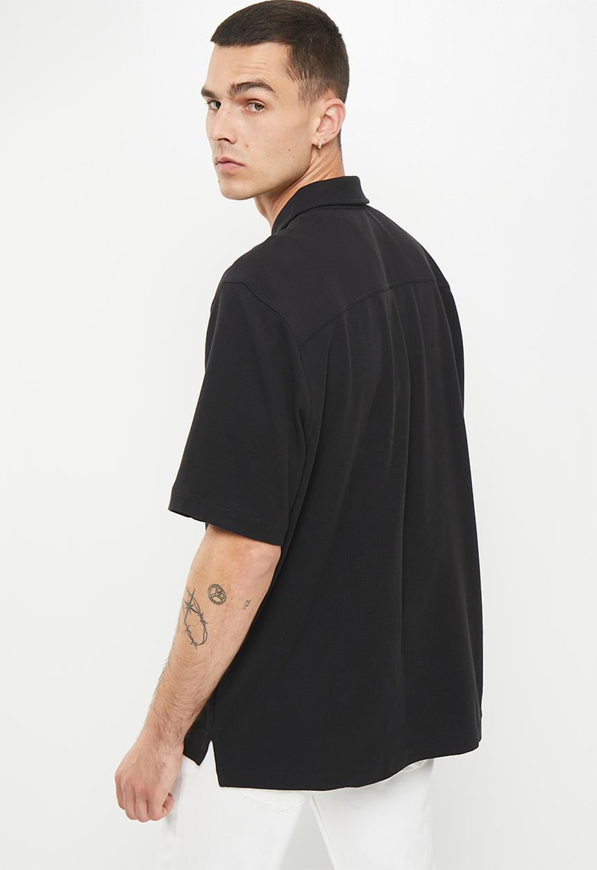 Calvin Klein - Institutional knitted short sleeve shirt - black