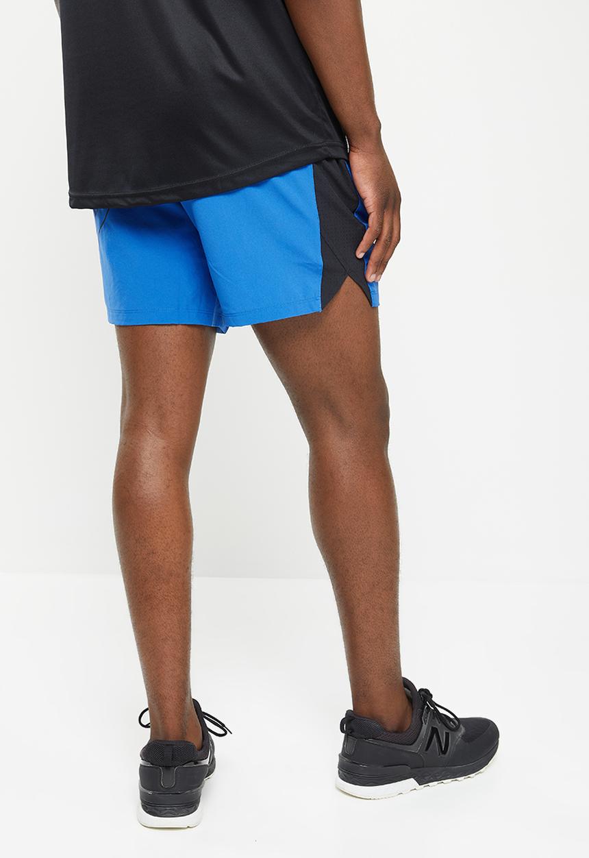 New Balance  - Tenacity 7in woven short graphic - blue