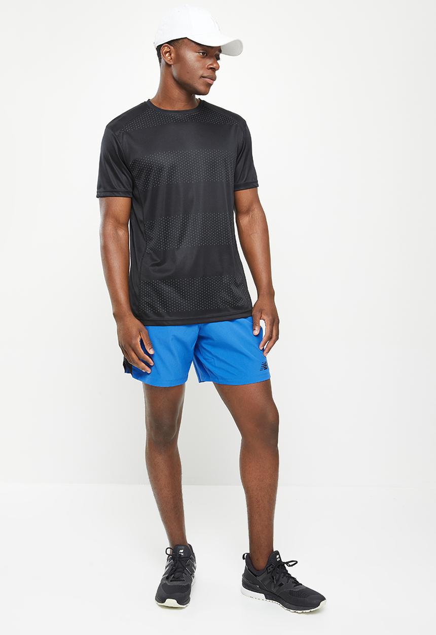New Balance  - Tenacity 7in woven short graphic - blue