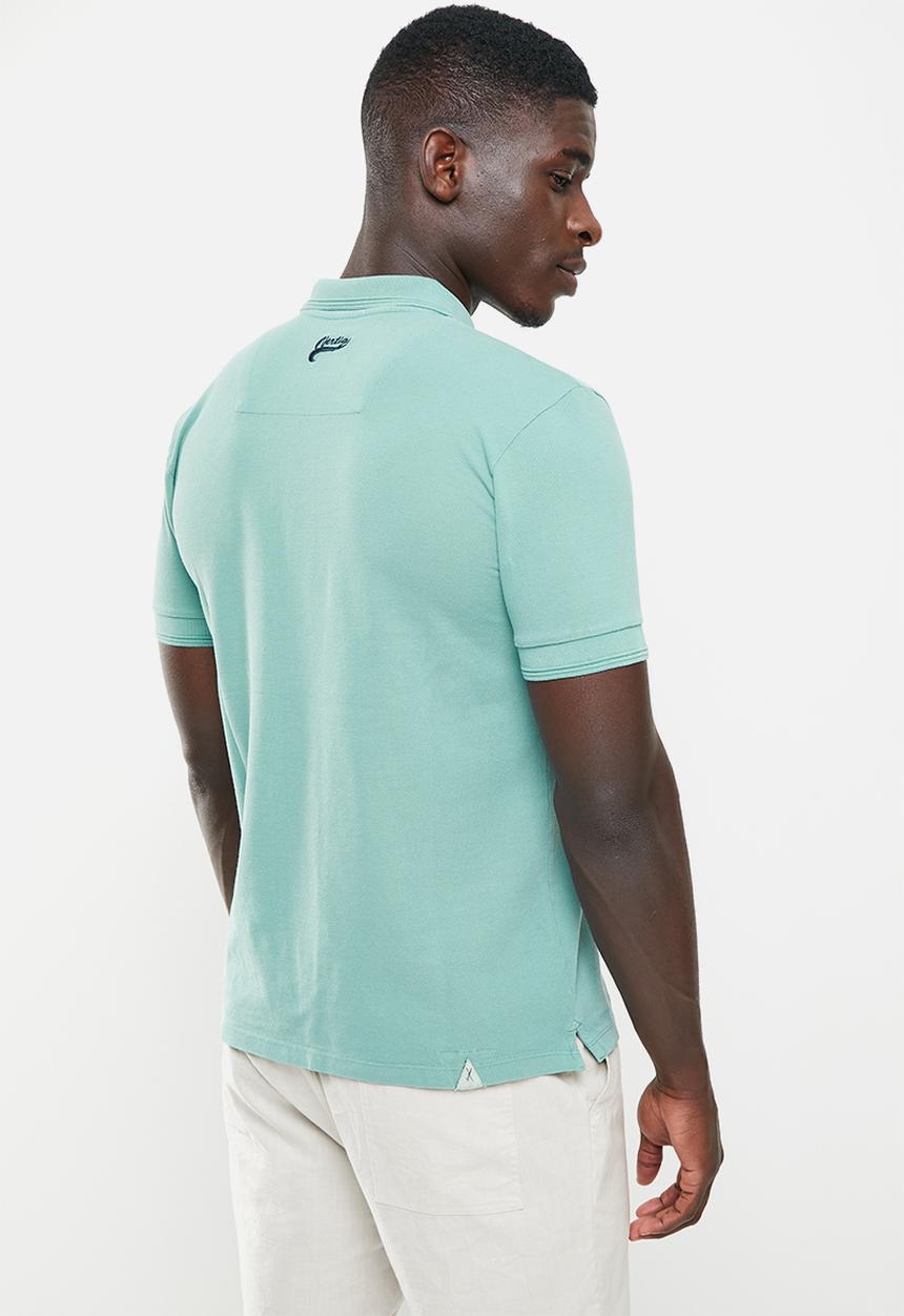 Vertigo - Vertigo badge embroidery pigment dyed  golfer - mineral blue