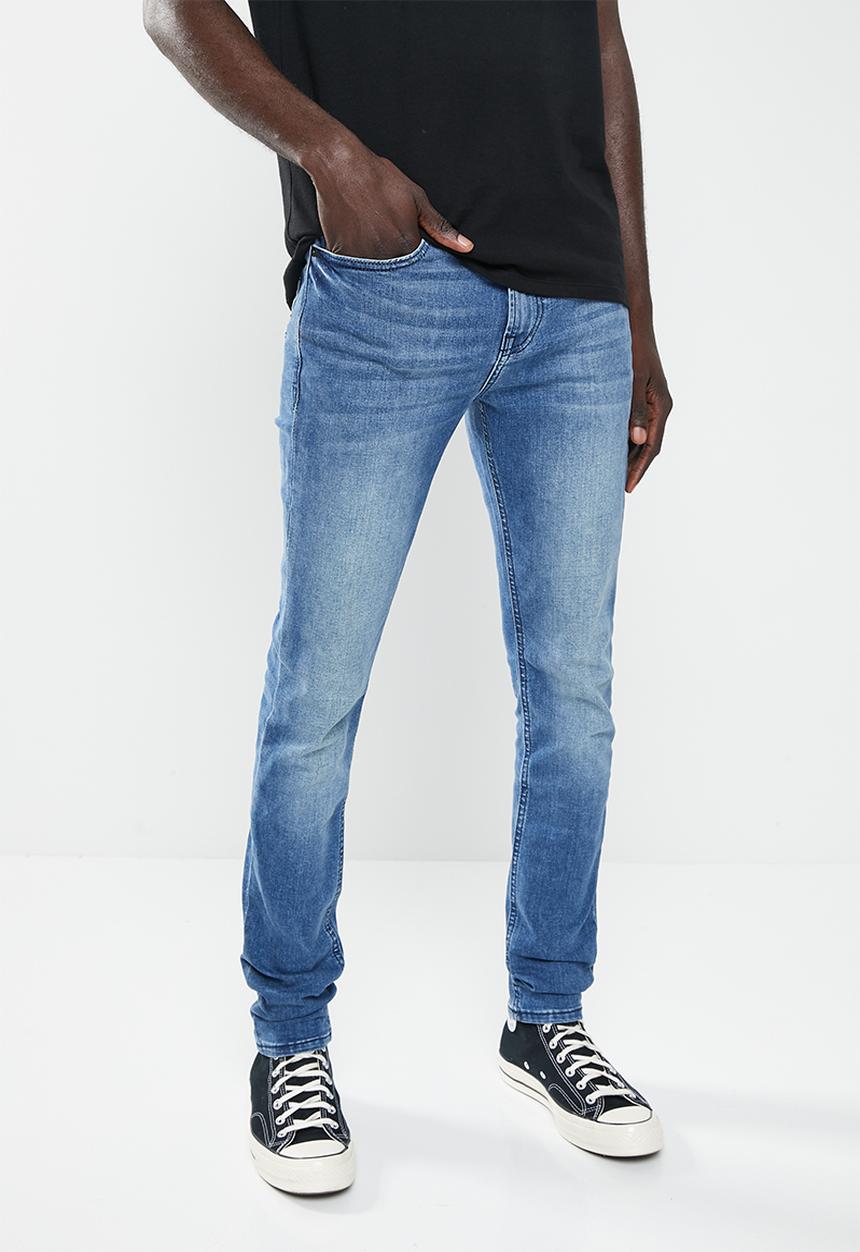 GUESS - An1monty super skinny - mid wash