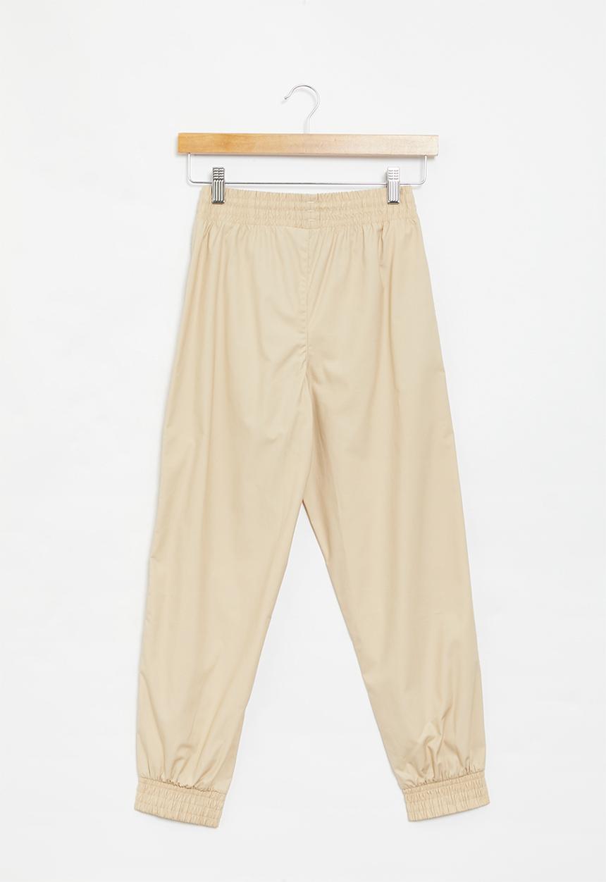 PUMA - Za boys chino pants - light sand