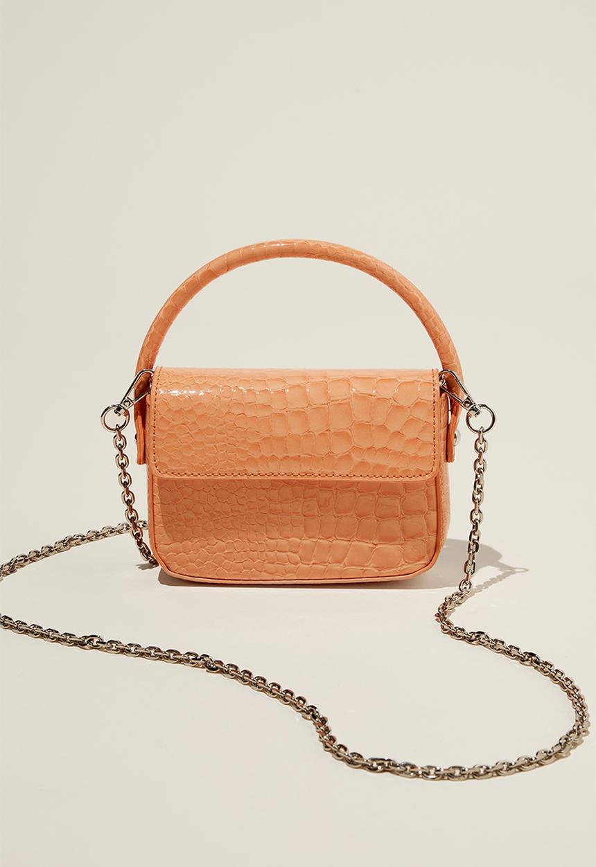 Cotton On - Jessie mini cross body bag - soft orange patent texture