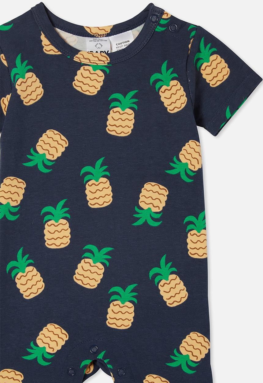 Cotton On - The short sleeve romper - indigo/tropical pineapples