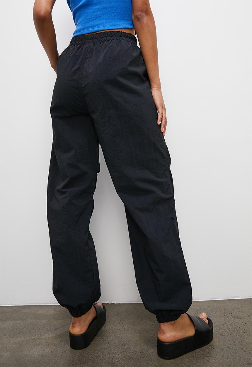 Blake - Parachute trousers - black