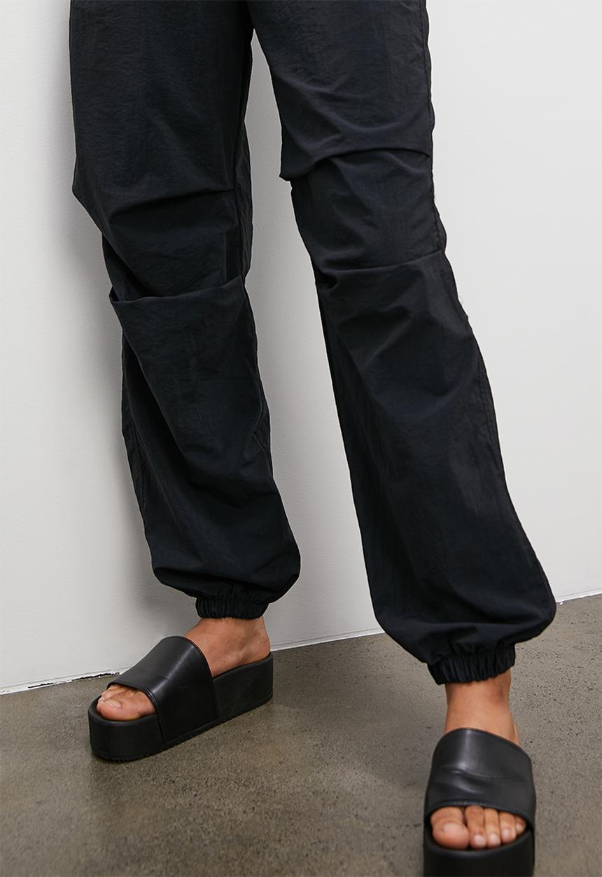 Blake - Parachute trousers - black