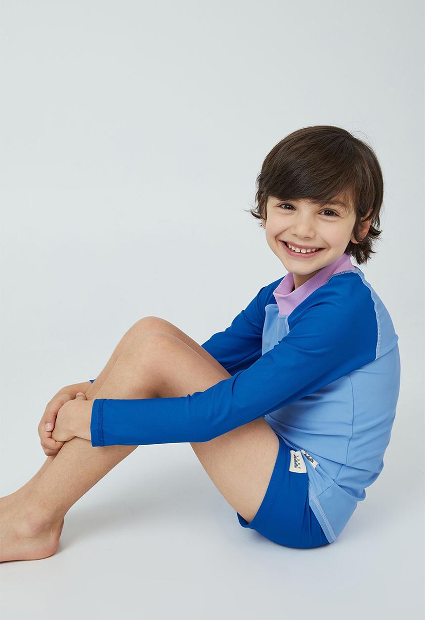 Cotton On - Flynn long sleeve raglan rash vest - blue bell/blue punch splice