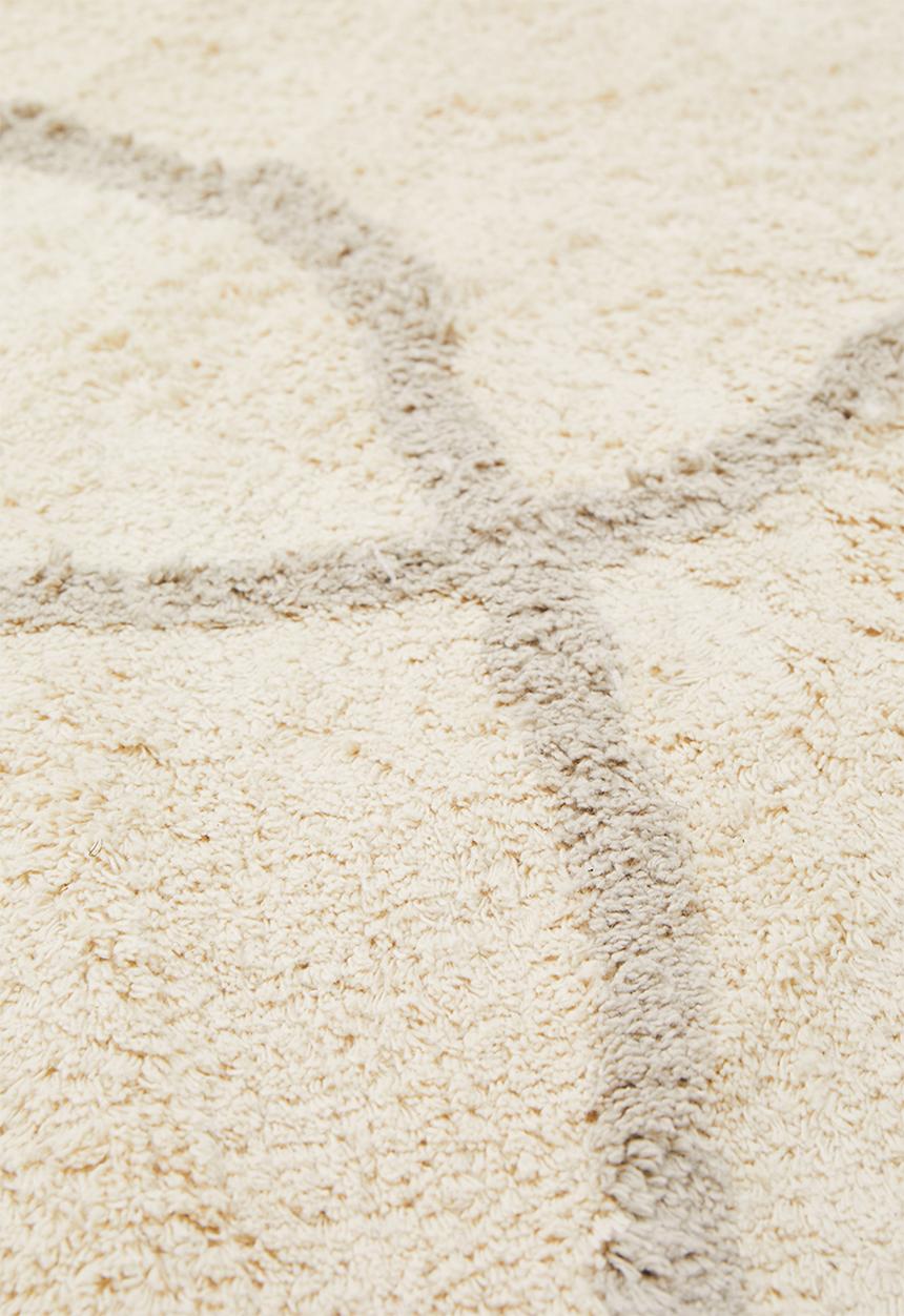 Sixth Floor - Linear tufted round rug - natural