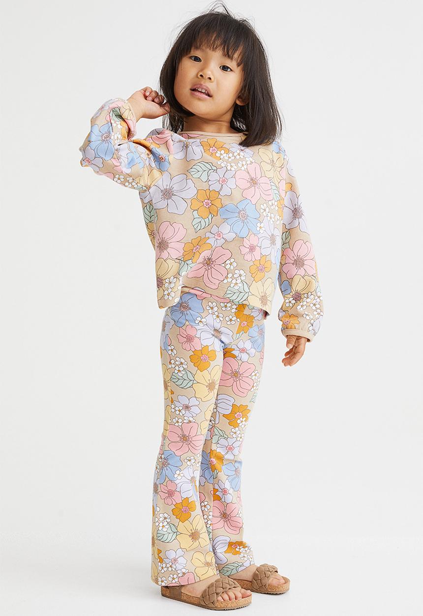 H&M - Flared leggings - beige/floral