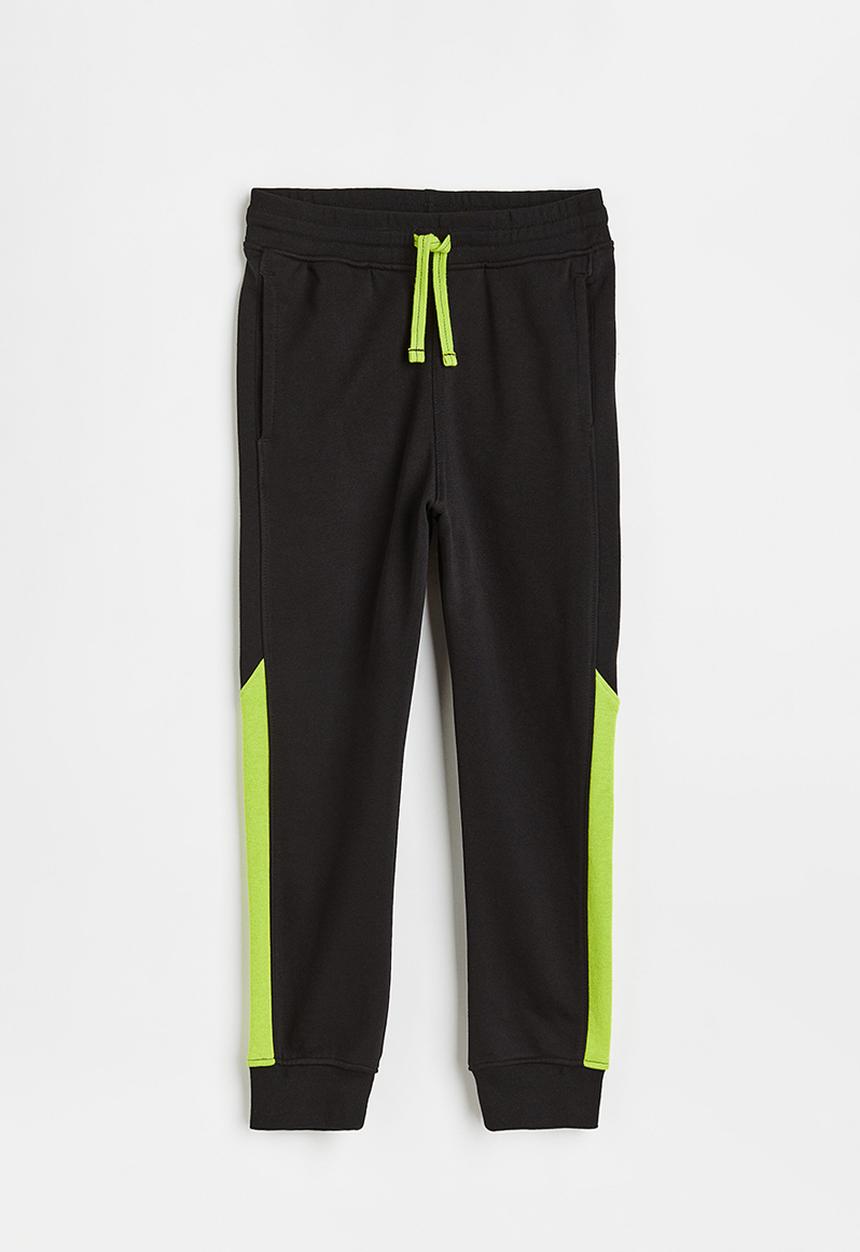 H&M - Sweatpants - black/neon green
