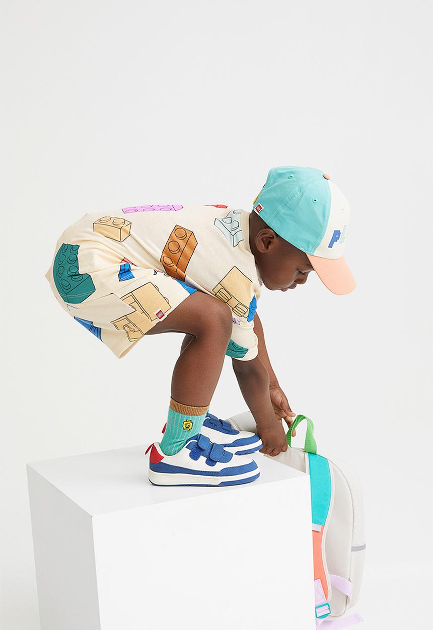H&M - Patterned sweatshorts - light yellow/lego® collection