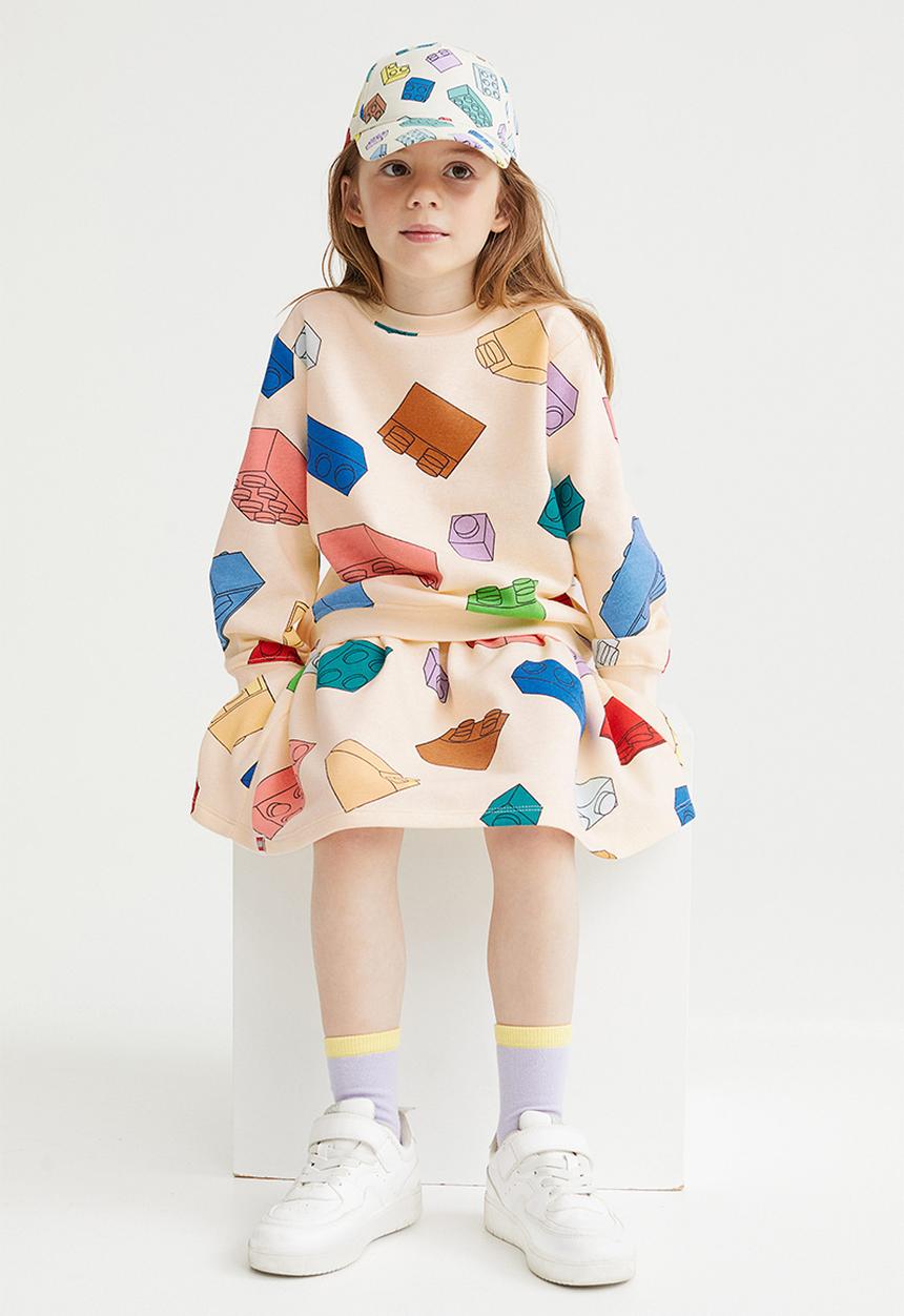 H&M - Printed sweatshirt skirt - light yellow/lego® collection