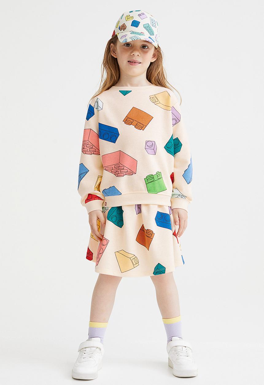 H&M - Printed sweatshirt skirt - light yellow/lego® collection