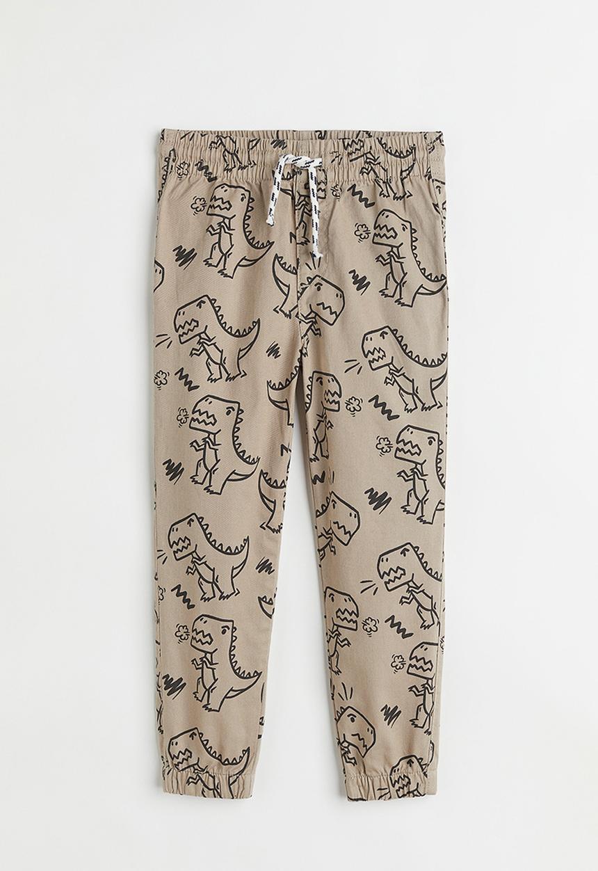 H&M - Relaxed fit joggers - beige/dinosaurs