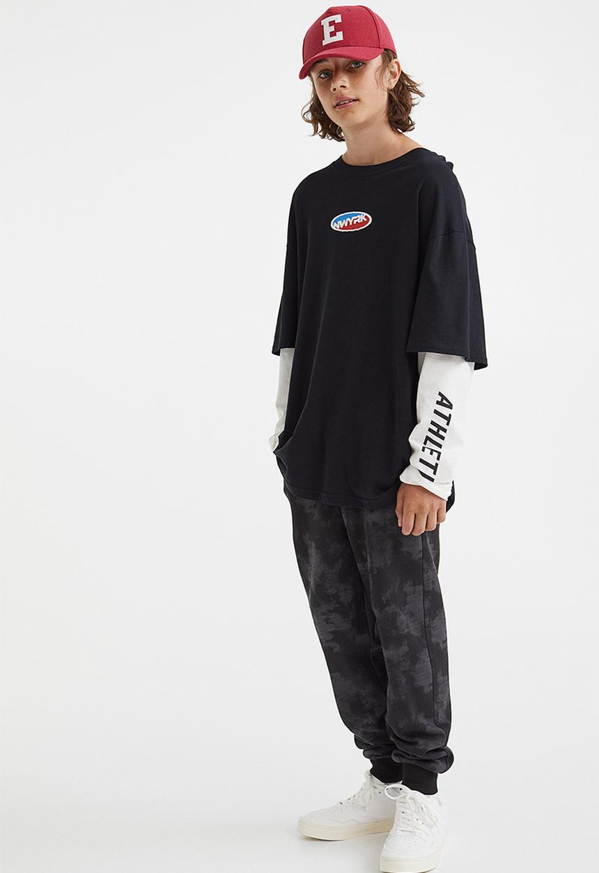 H&M - Printed joggers - black/tie-dye