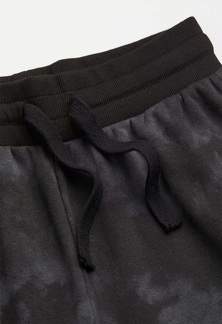 H&M - Printed joggers - black/tie-dye