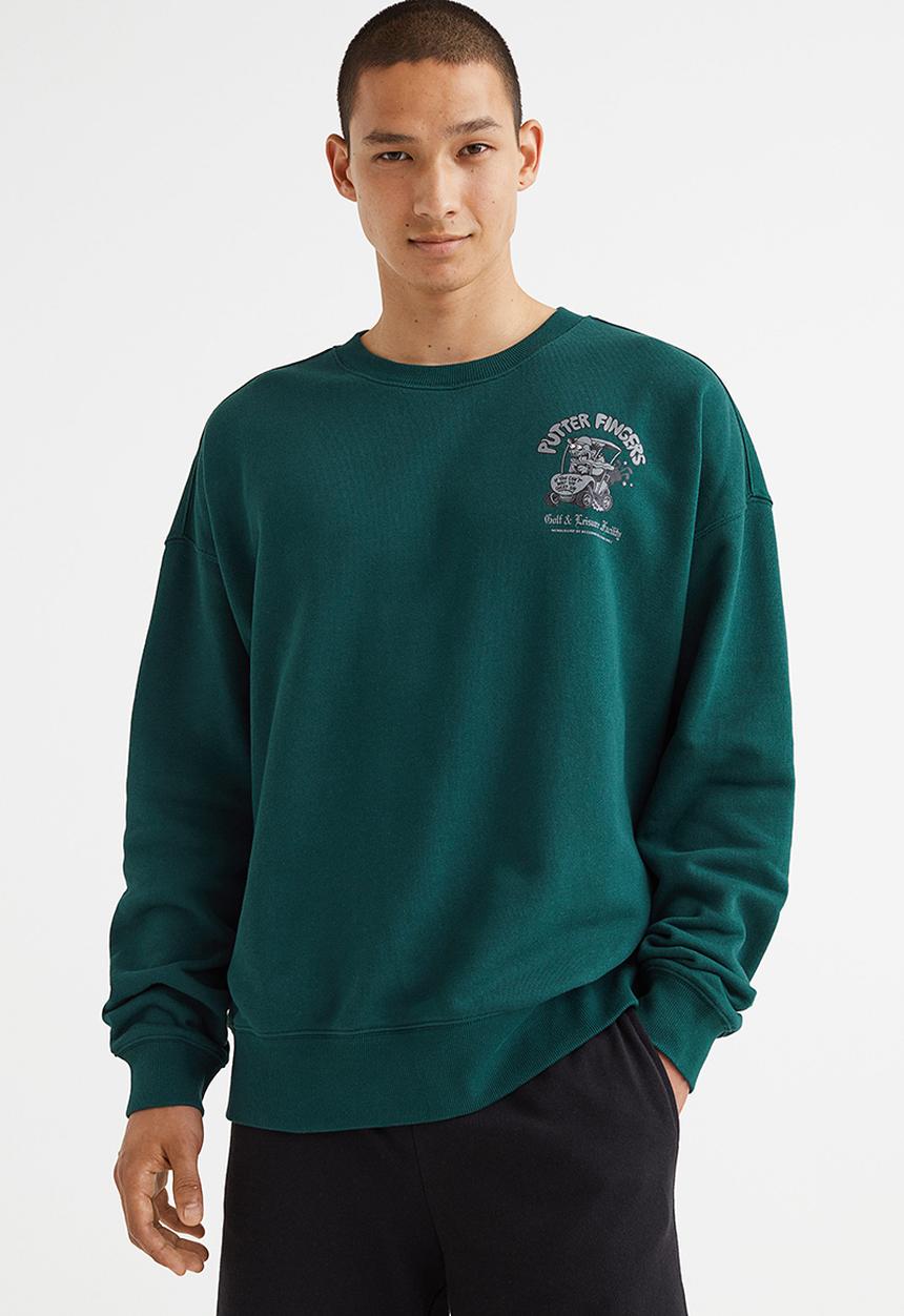 H&M - Relaxed fit sweatshirt - dark green/putter fingers