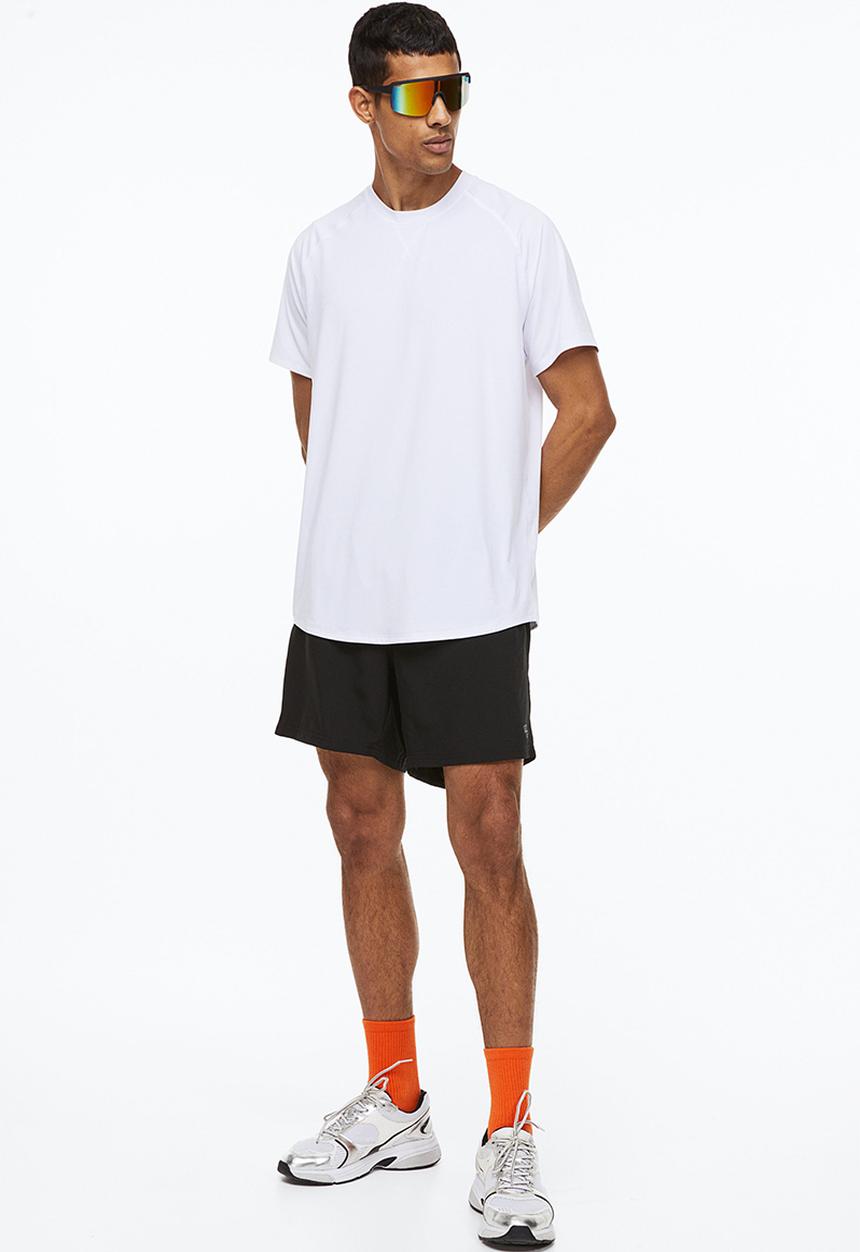 H&M - Fast-drying sports shorts - black