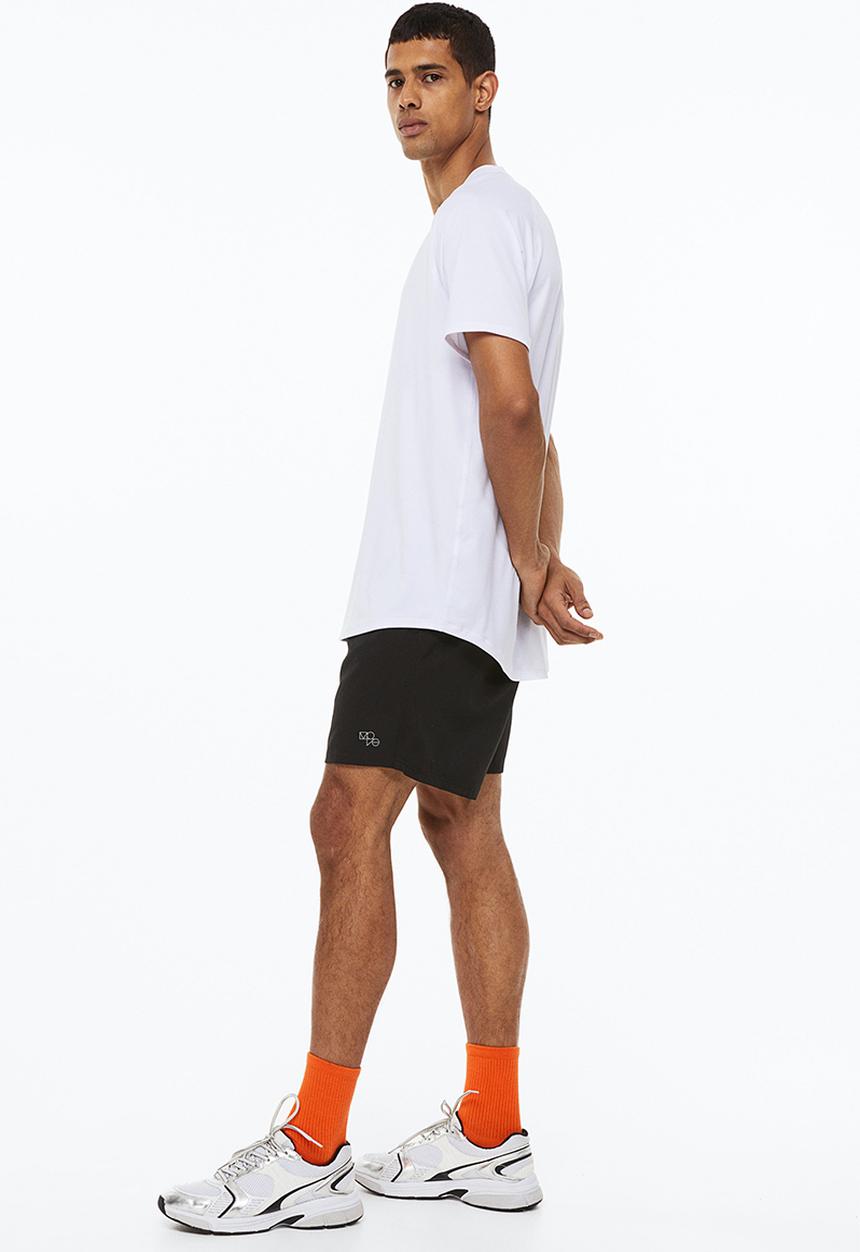 H&M - Fast-drying sports shorts - black