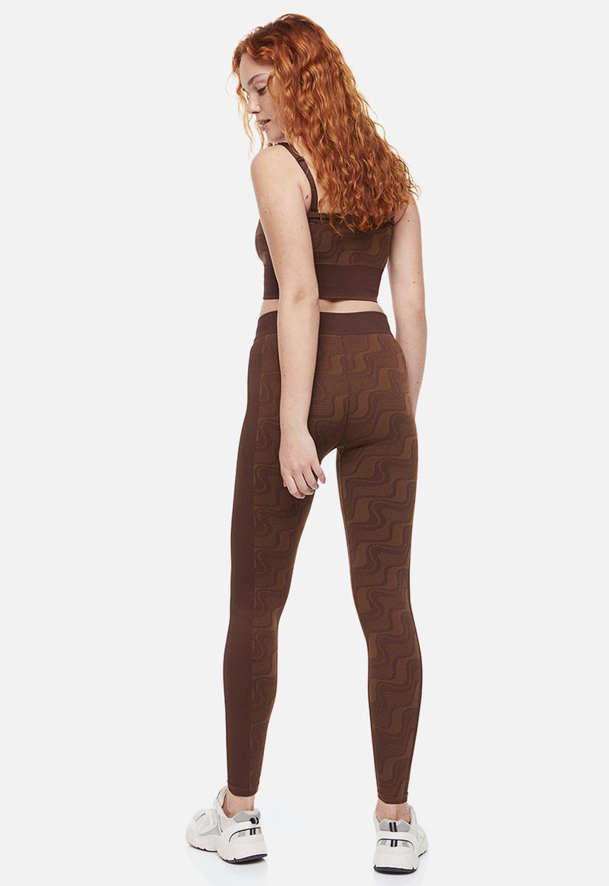 H&M - Seamless sports tights - dark brown/patterned