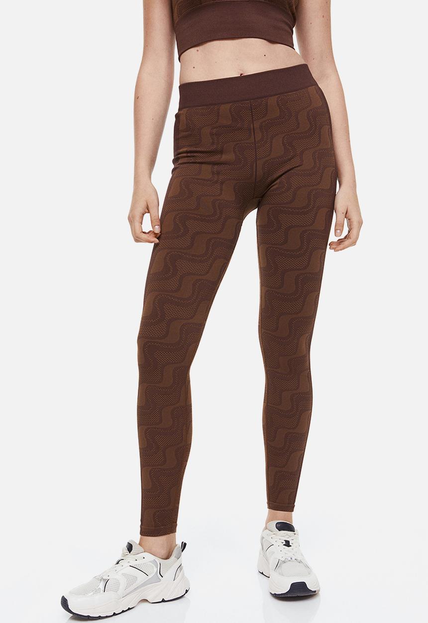 H&M - Seamless sports tights - dark brown/patterned