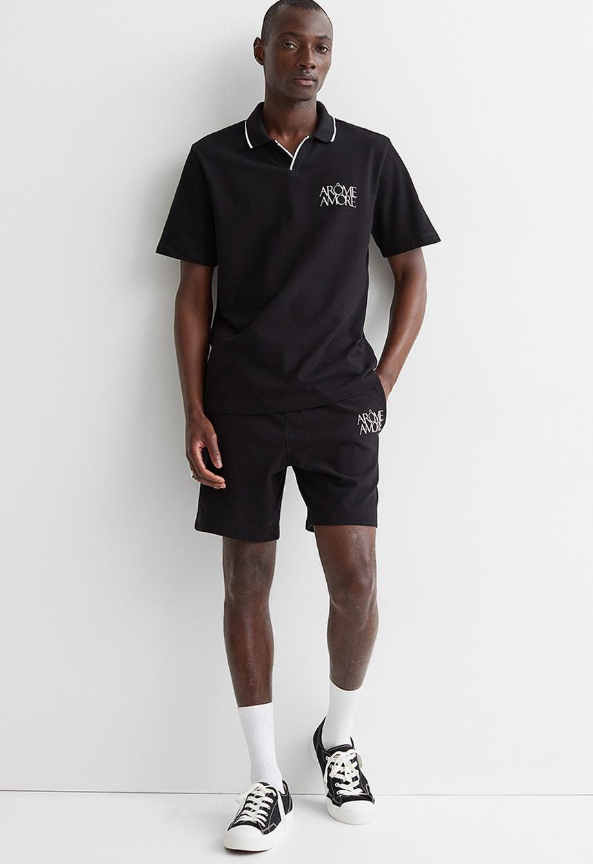 H&M - Regular fit polo shirt - black/arôme
