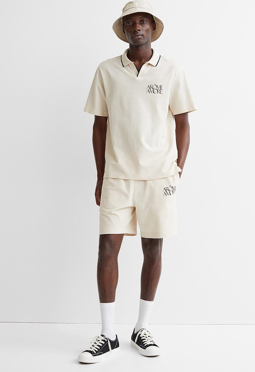 H&M - Regular fit polo shirt - cream/arôme