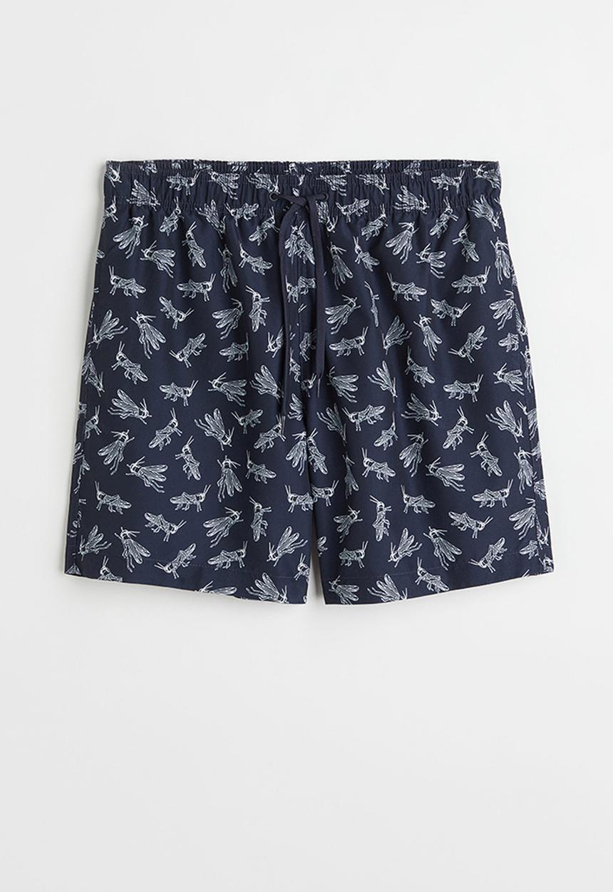 H&M - Patterned swim shorts - dark blue/grasshoppers