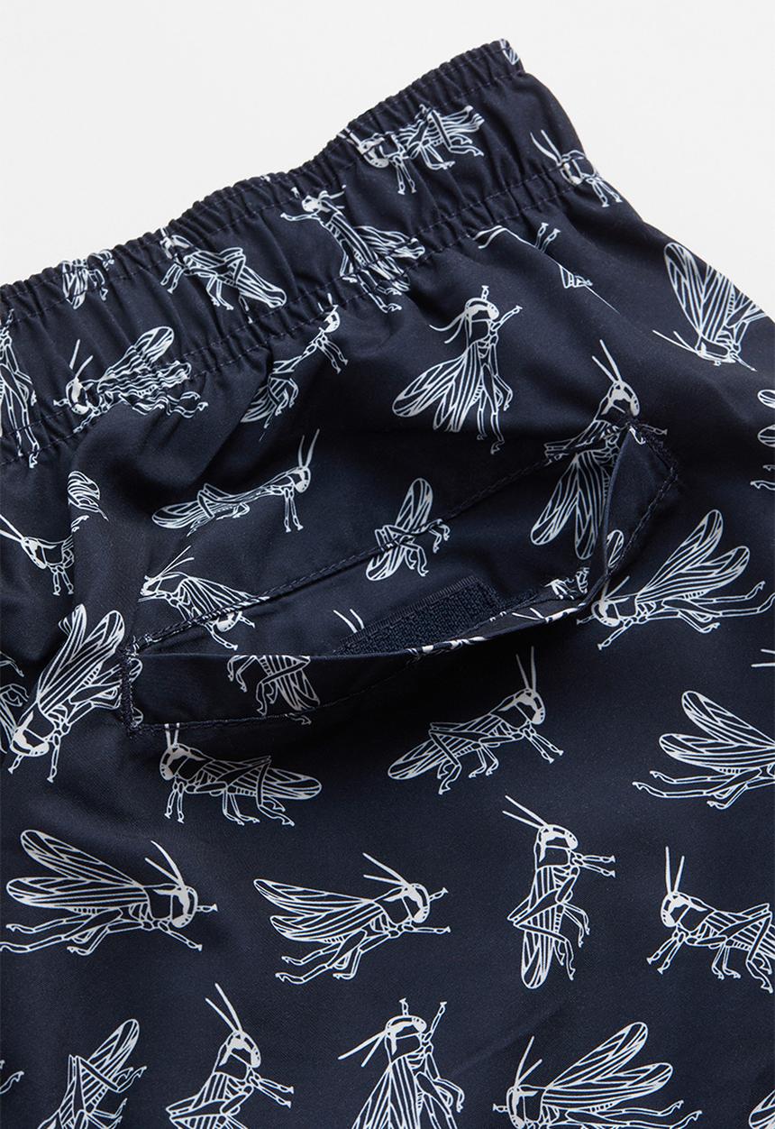 H&M - Patterned swim shorts - dark blue/grasshoppers