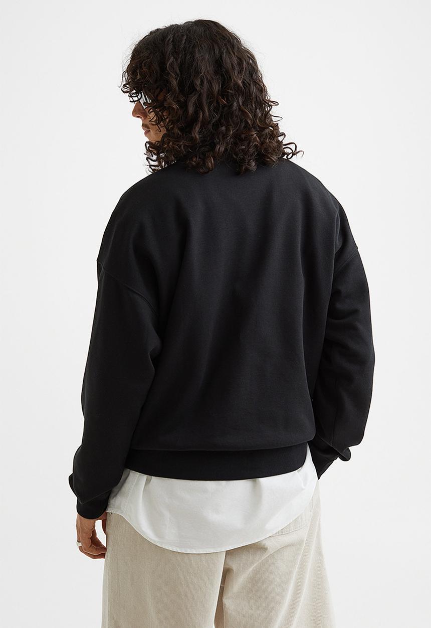 H&M - Relaxed fit sweatshirt - black/outkast