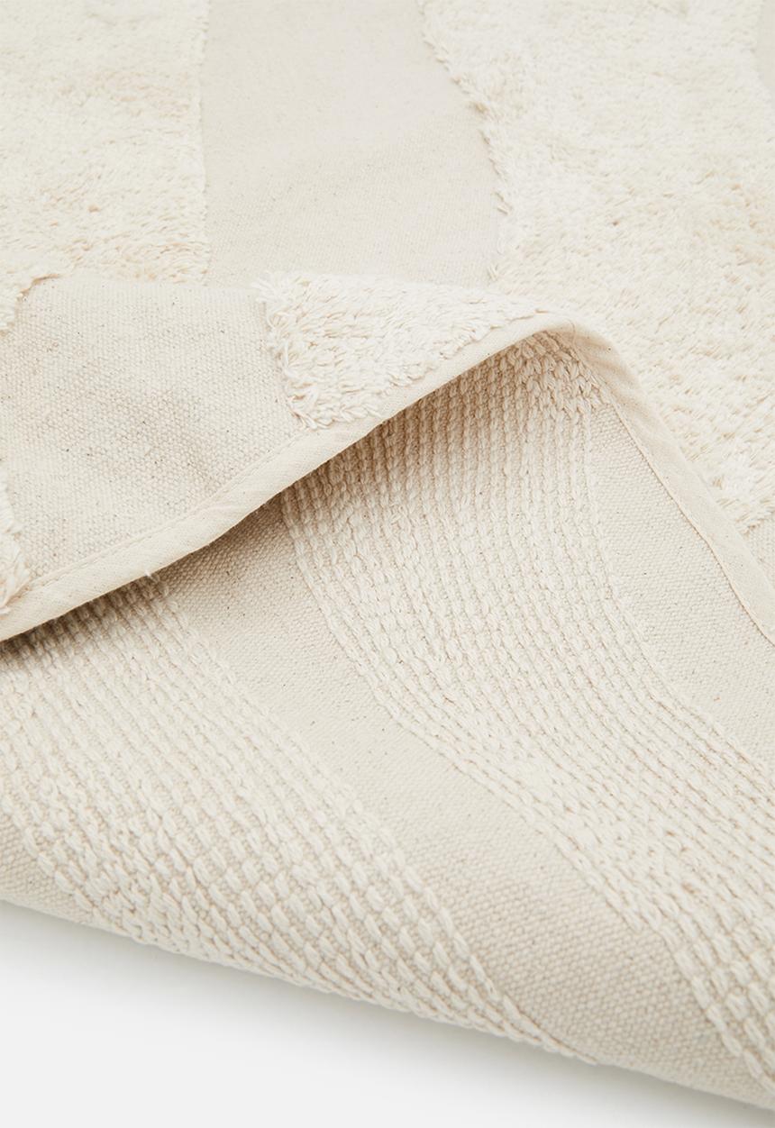 Sixth Floor - Swirl tufted round rug - cream