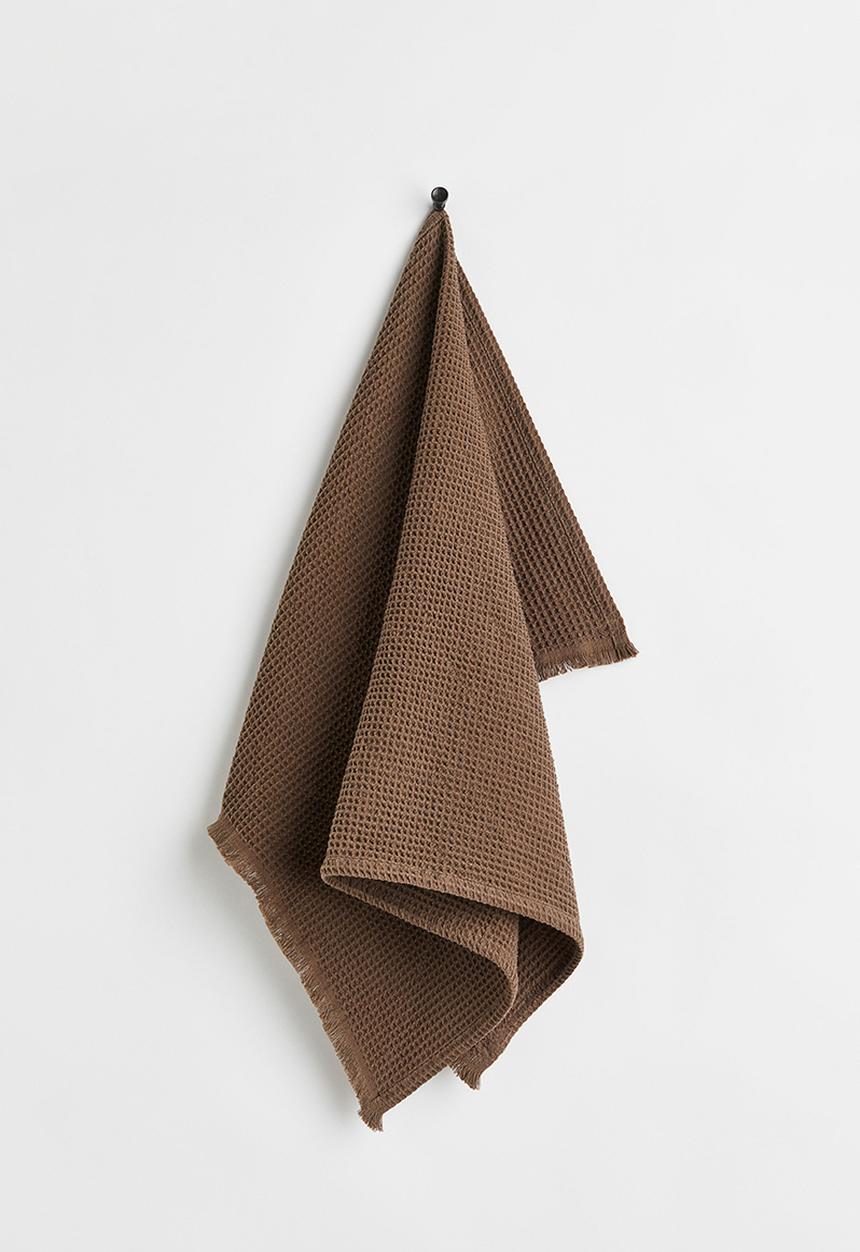 H&M - Waffled hand towel - brown