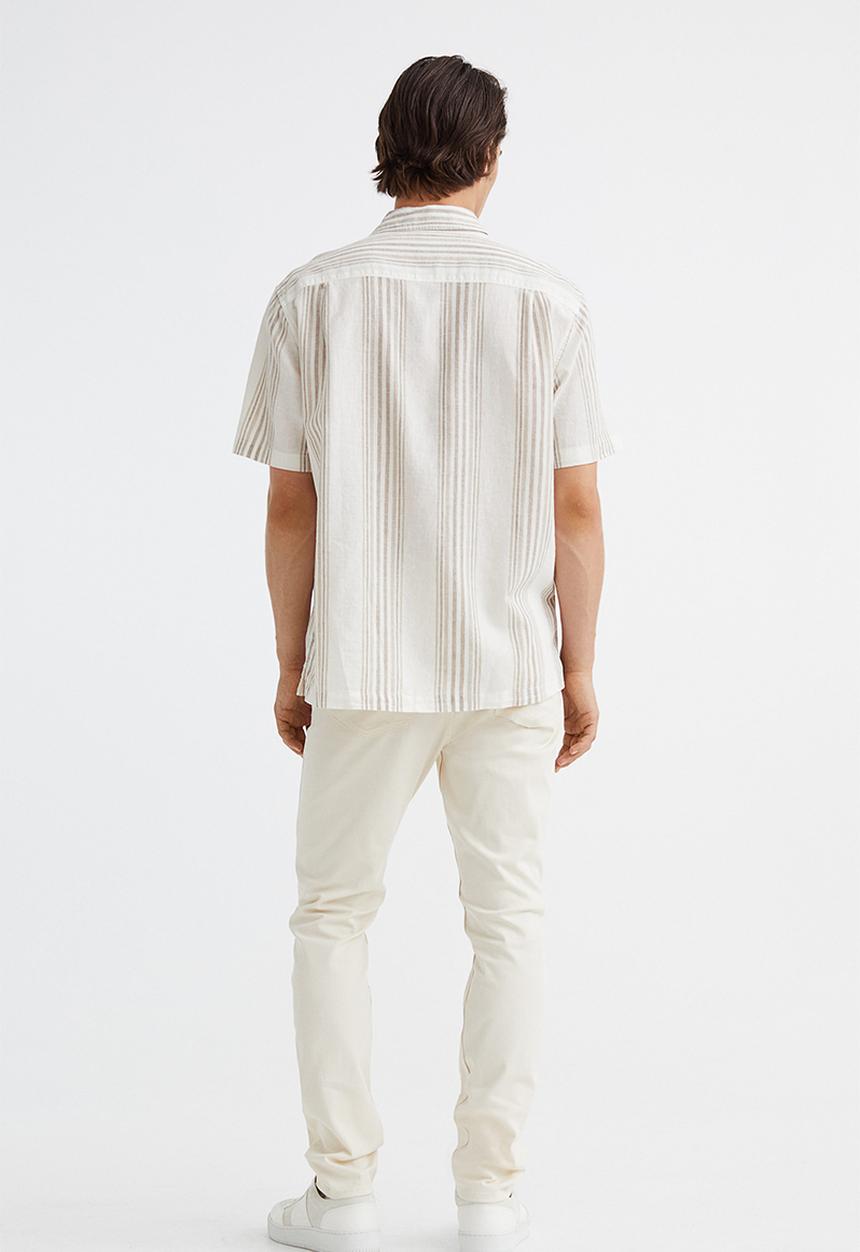 H&M - Slim fit cotton twill trousers - cream