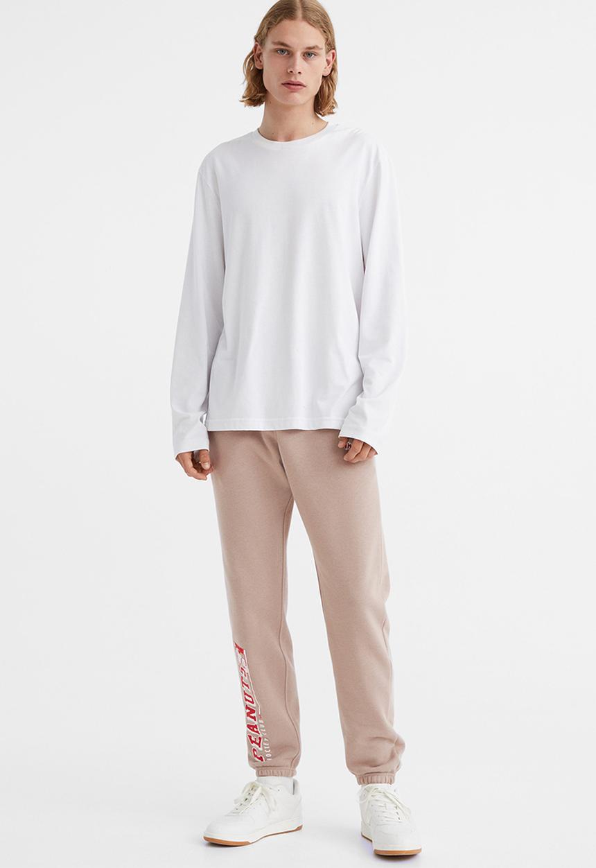 H&M - Regular fit sweatpants - beige/snoopy