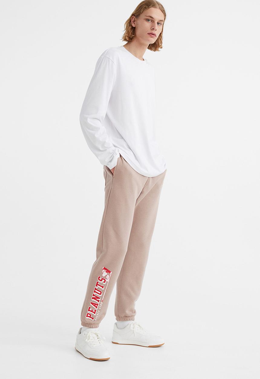 H&M - Regular fit sweatpants - beige/snoopy