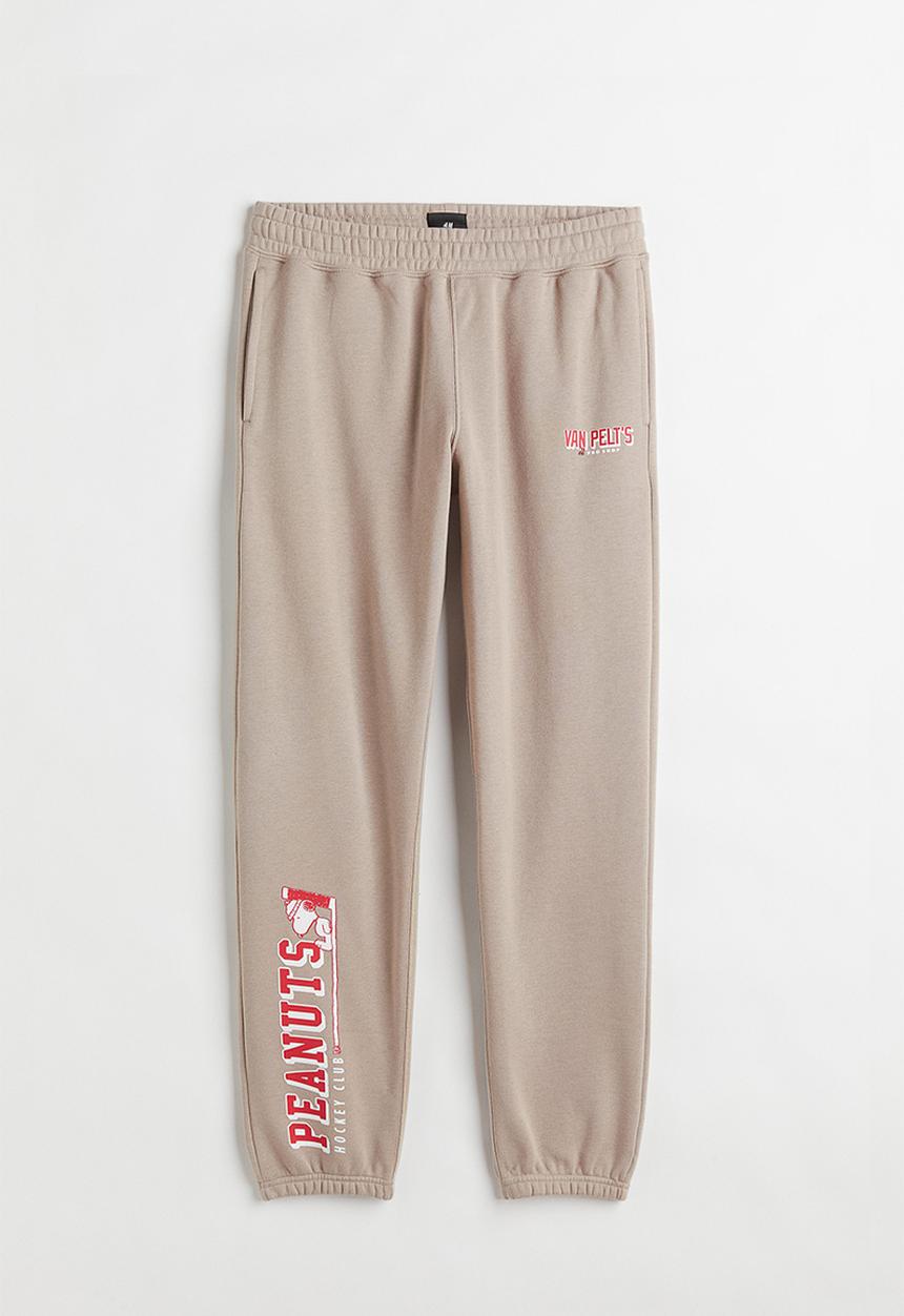 H&M - Regular fit sweatpants - beige/snoopy